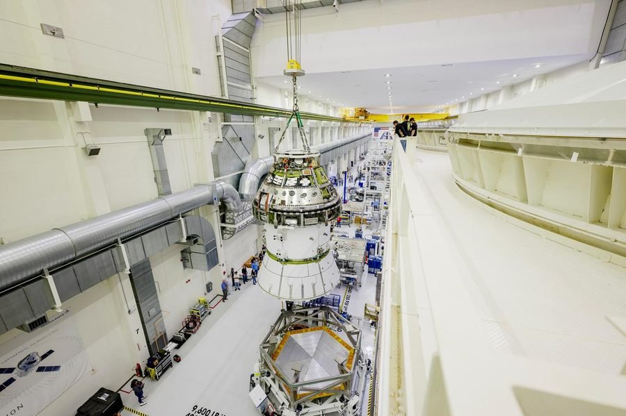 Orion spacecraft for Artemis II lifted into a vacuum chamber for testing